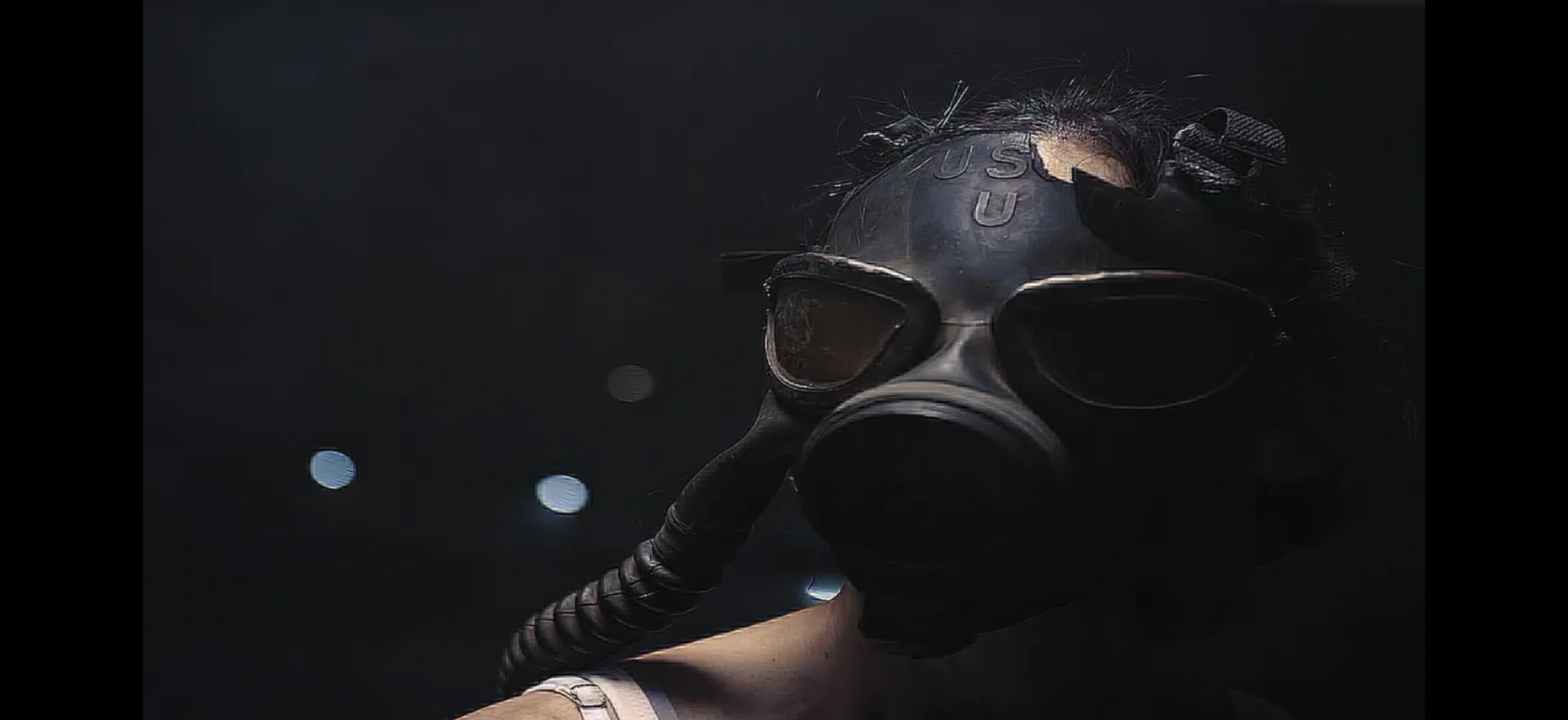 Close-up of a gas mask and dark glasses