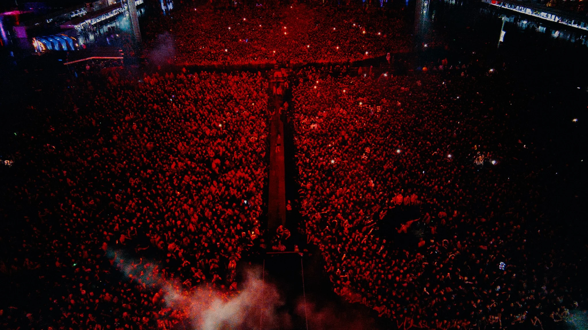 An overhead view of the Niteharts crowd illuminated in red
