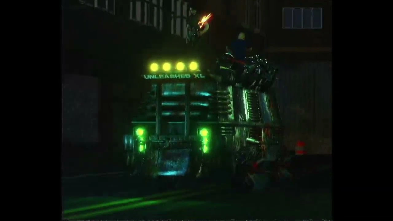 A green-lit Unleashed XL tour bus at night