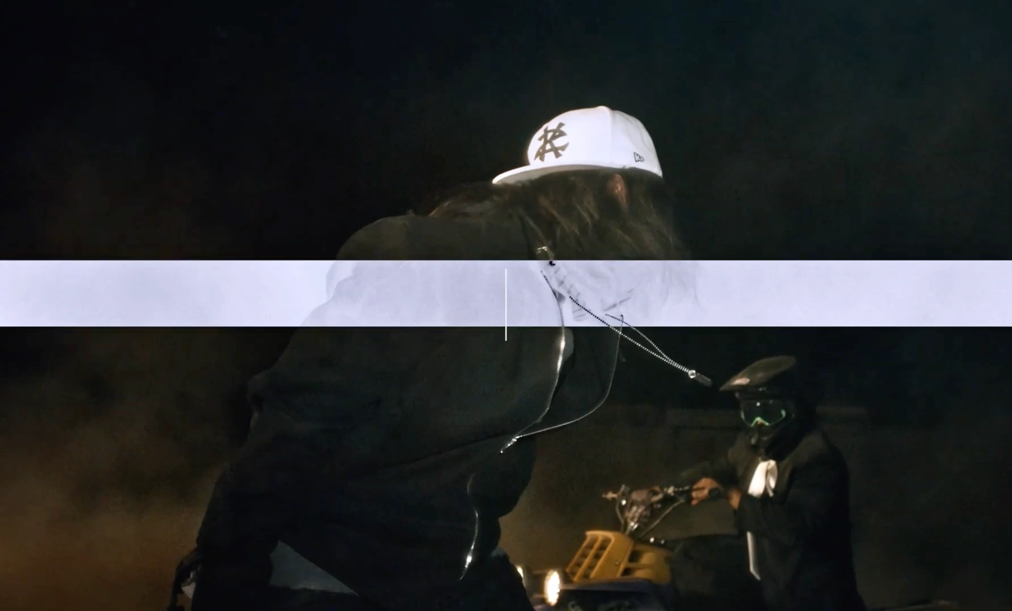 A fragmented frame of Knock2 with a pale horizontal band